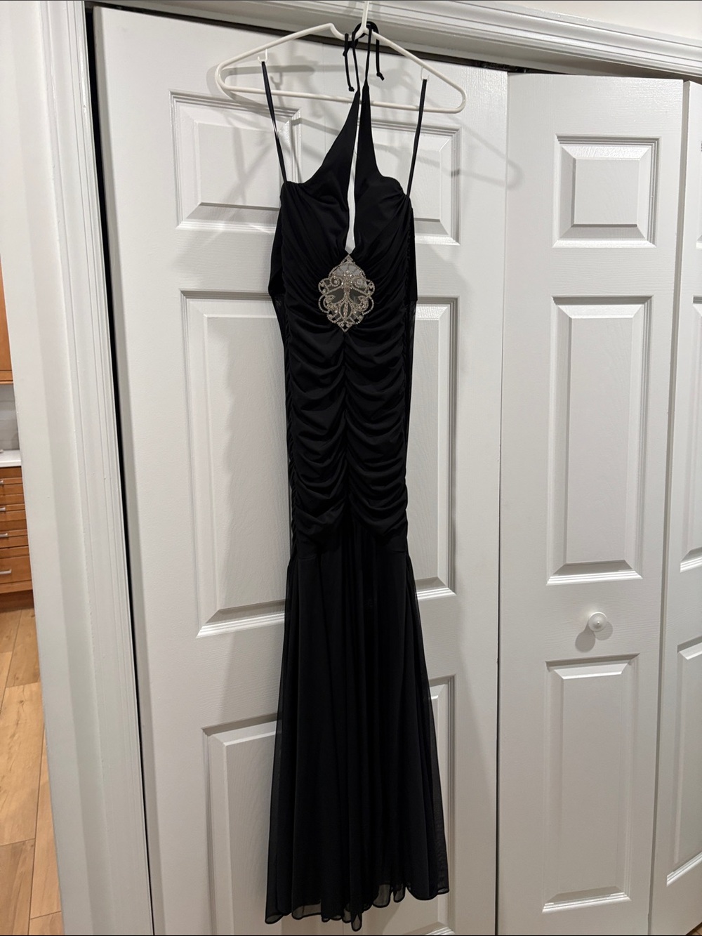Cache Black Ruched Halter Gown with Silver Medallion